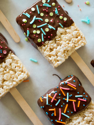 chocolate dipped rice krispy on a stick